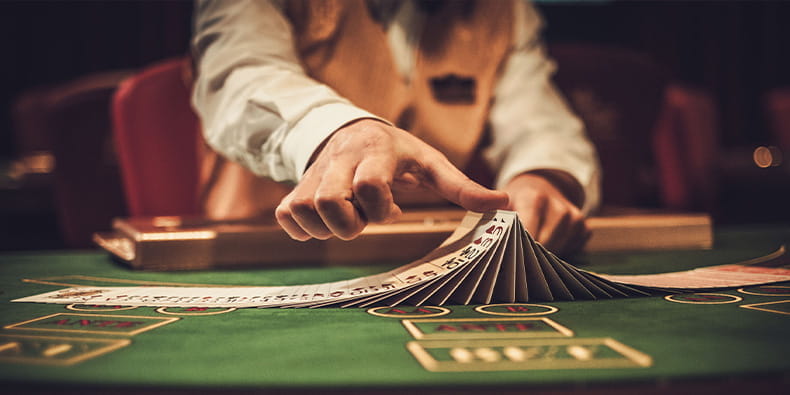 Casino Croupier Shuffles the Card Deck