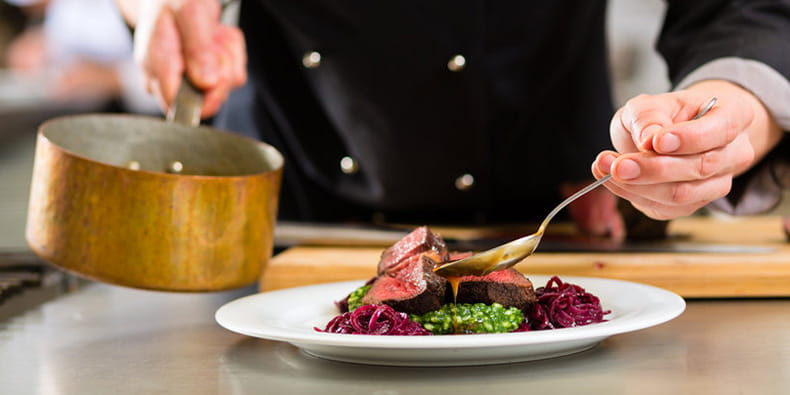 Chef Preparing a Dish