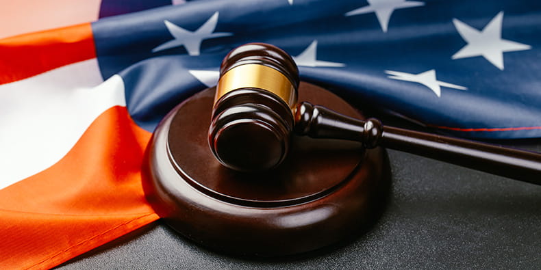 The judge gavel and background with USA flag